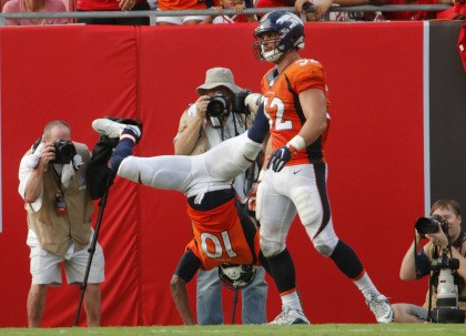 TAMPA, FL - OCTOBER 2: Emmanuel Sanders #10 of the Denver Broncos celebrates his touchdown with a somersault during the fourth quarter of their game the Tampa Bay Buccaneers at Raymond James Stadium on October 2, 2016 in Tampa, Florida. (Photo by Joseph Garnett Jr. /Getty Images)