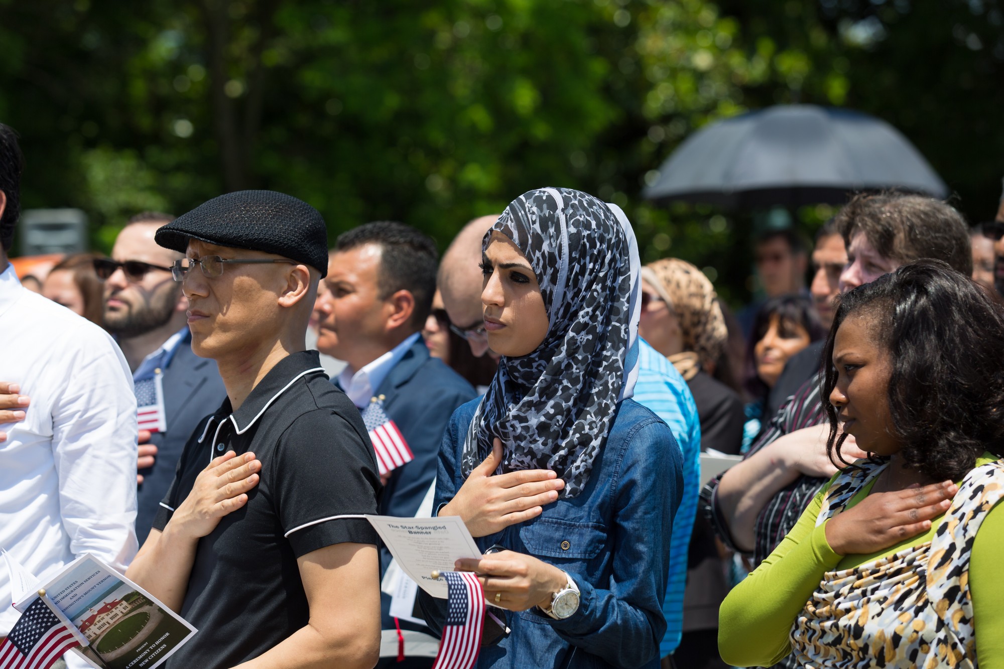 woman in crowd during naturalization ceremony at mount vernon 